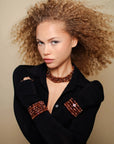 Model wearing the Valerie Necklace in Caramel, styled with matching bracelets for a bold, cohesive look.