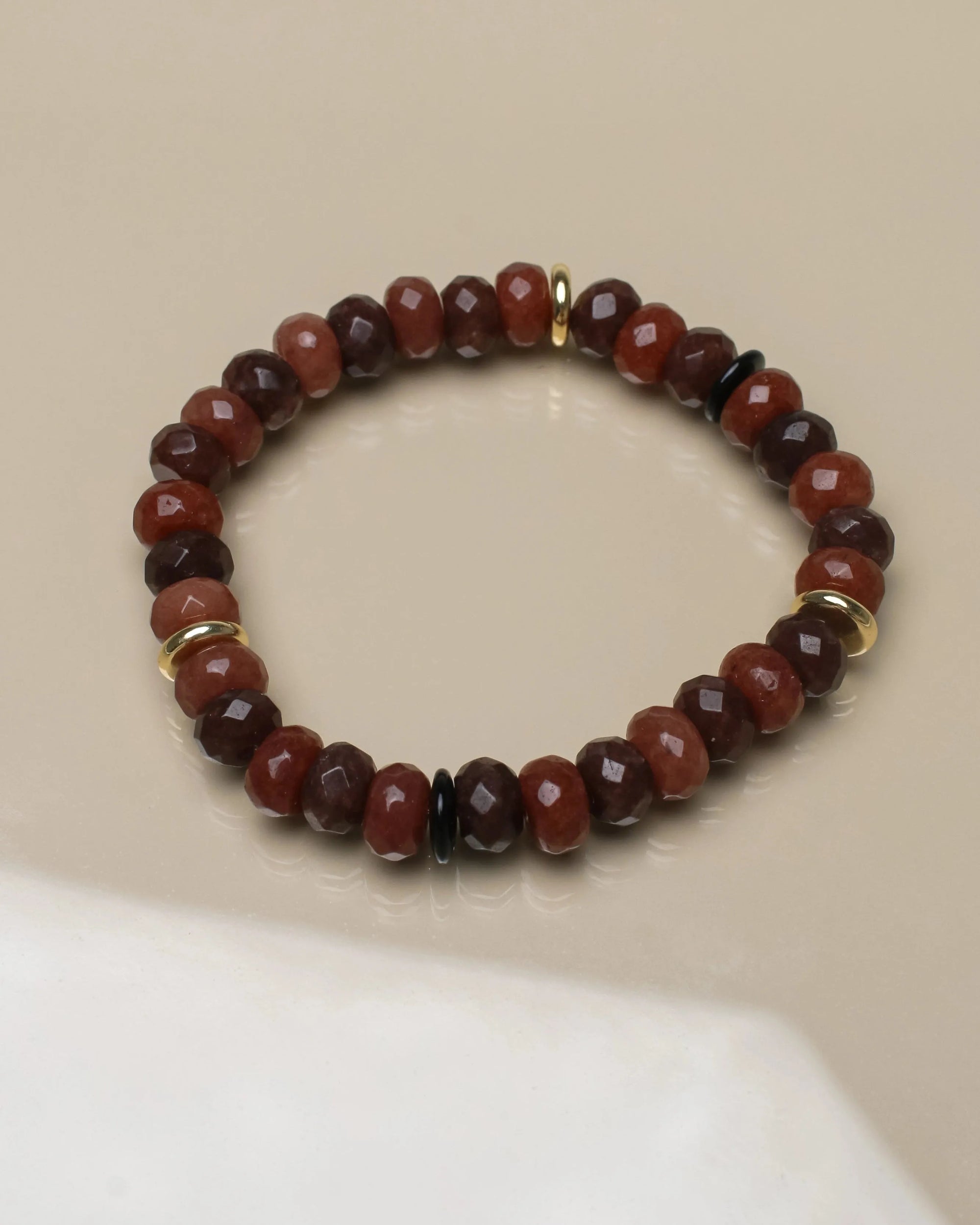 Single bracelet from the Zoe Bracelet Set in Espresso, displayed flat to emphasize its earthy tones and polished design.