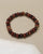 Single bracelet from the Zoe Bracelet Set in Espresso, displayed flat to emphasize its earthy tones and polished design.
