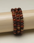 Close-up of the Zoe Bracelet Set in Espresso, neatly stacked to showcase the rich brown quartz beads with vibrant dividers.